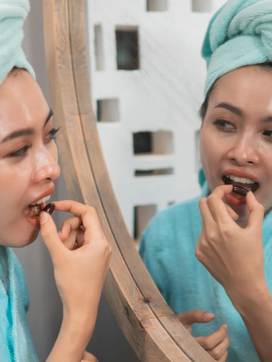 Person choosing a health supplement in a China retail setting